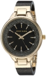 Anne Klein Women’s AK/1408BKBK Premium Crystal Accented Gold-Tone and Black Shimmer Resin Bangle Watch @ $26.76